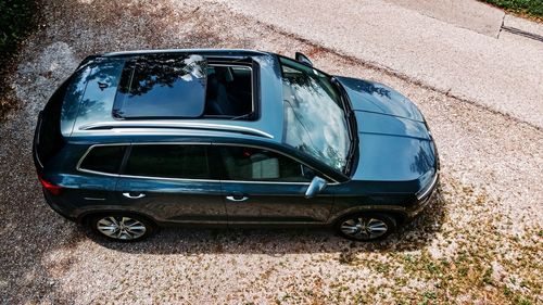 High angle view of car parked on road