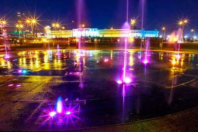 Illuminated street lights at night