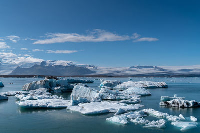 Scenic view of frozen sea against sky