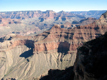 Aerial view of rock formations against sky