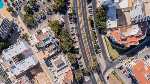 High angle view of street amidst buildings in city