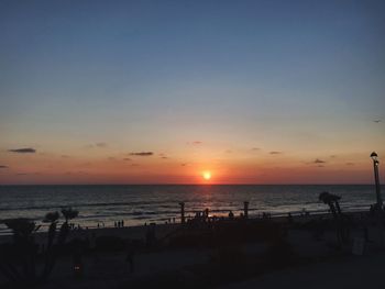 Scenic view of beach during sunset