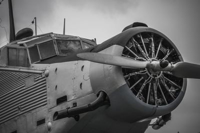 Abandoned airplane against sky