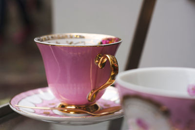 Close-up of tea cup on table