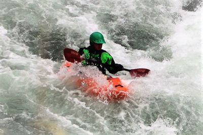 Man surfing in river