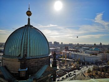 Buildings in city against sky