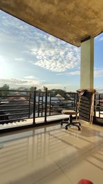 Scenic view of swimming pool against sky seen from balcony