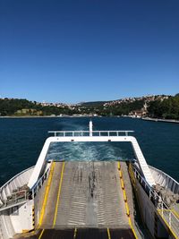 High angle view of swimming pool by sea against clear sky