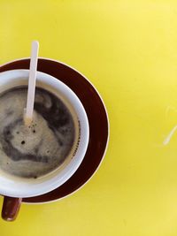 High angle view of coffee cup on table