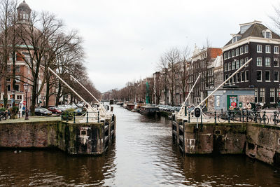 View of canal with buildings in background