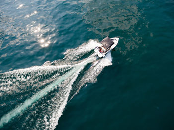 High angle view of boat sailing on sea