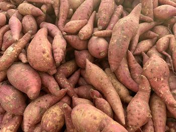 Full frame shot of sweet potato for sale at market stall