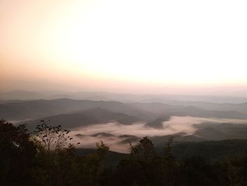 Scenic view of mountains against sky during sunset