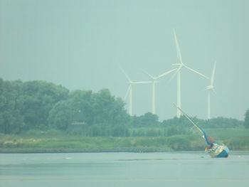 Windmills on landscape