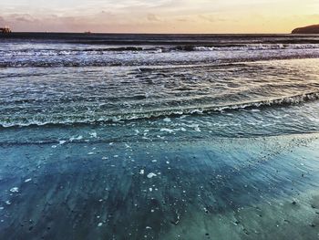 Scenic view of sea against sky during sunset