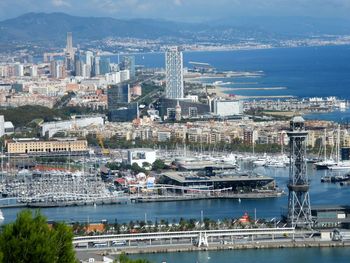 High angle view of sea and buildings in city