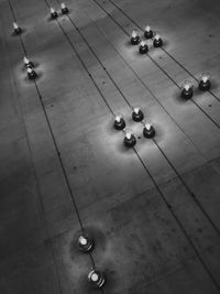 High angle view of people playing on street in city
