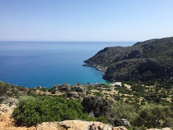 Scenic view of sea against clear blue sky