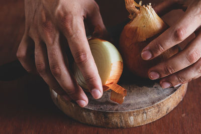 Close-up of man preparing food