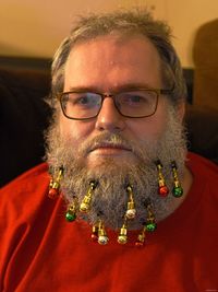 Portrait of man wearing eyeglasses