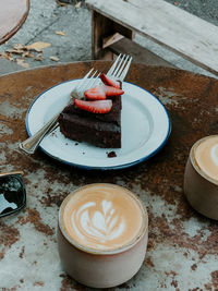 Close-up of cake and coffee on table