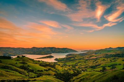 Scenic view of landscape against sky during sunset