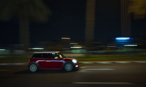 Cars on road at night