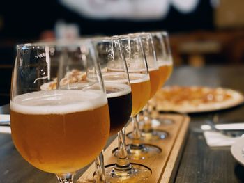 Close-up of beer glass on table