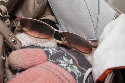 Close-up of sunglasses on sofa