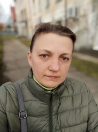 Close-up portrait of mature woman with short hair