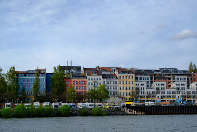 River by city against sky