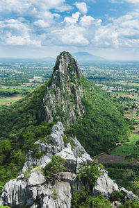 Landscape view from top of khao nor, thailand. thee beautiful limestone mountain against cloudy sky