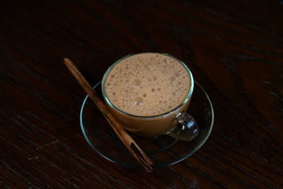 High angle view of coffee cup on table