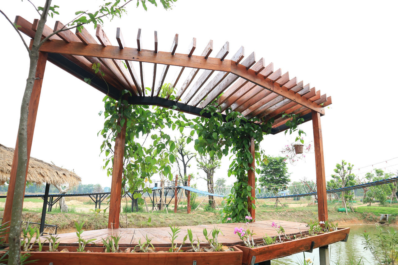 CHAIRS AND TABLE AGAINST SKY