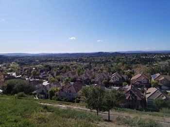 Scenic view of townscape against sky