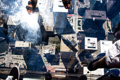 Digital composite image of man and cityscape