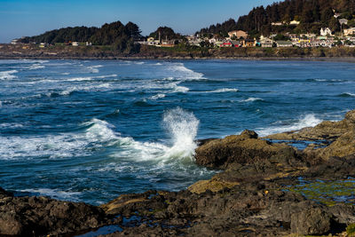 Scenic view of oregon coastal city against sky