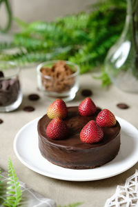 Close-up of strawberries in plate on table