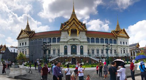 Group of people in front of historic building