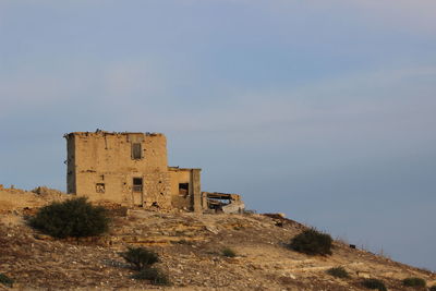 Low angle view of historic building against sky