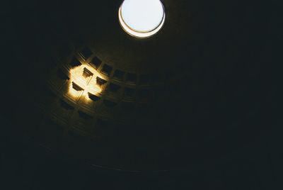 Low angle view of sky light in building