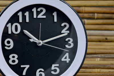 Close-up of clock on wall