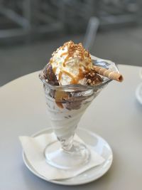 Close-up of ice cream in glass on table