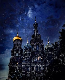 Low angle view of building against sky at night