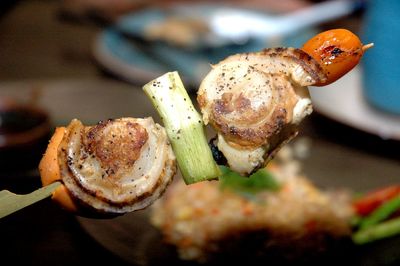 Close-up of grilled meat on barbecue skewer