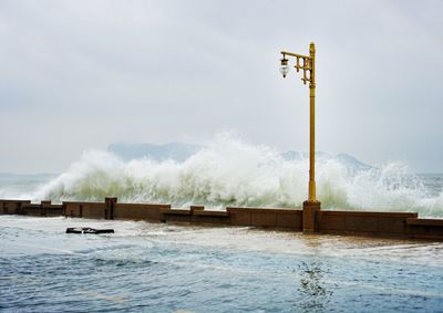 Sea waves hit the shore.storm surge concept