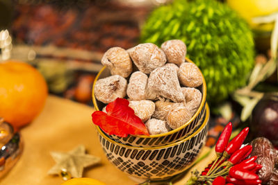 Close-up of fruits in basket on table