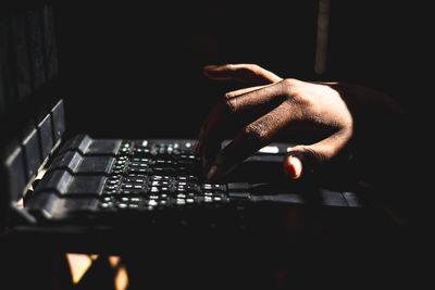 Close-up of hand using mobile phone