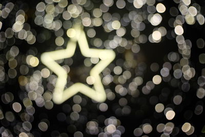 Defocused image of illuminated christmas lights