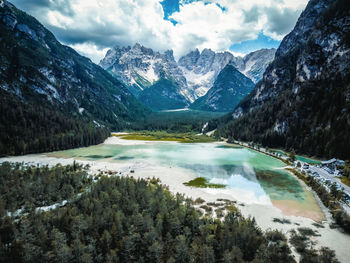 Scenic view of snowcapped mountains against sky